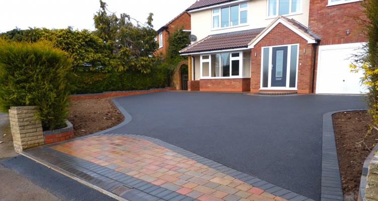 new tarmac driveway installed on front of UK property