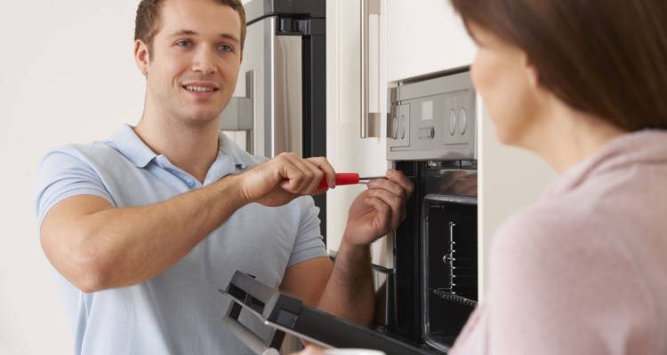 electrician installing cooker