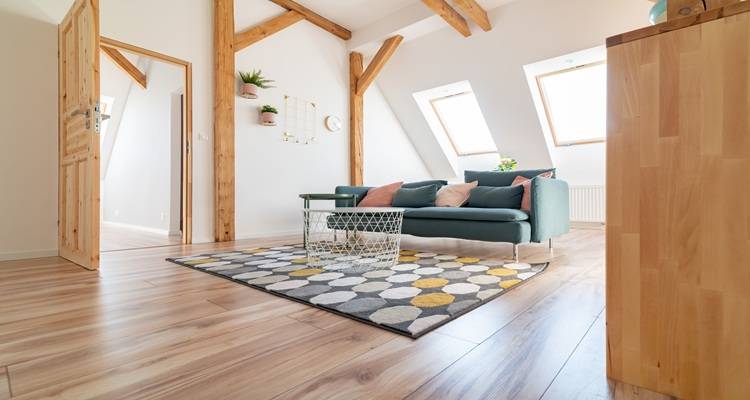 interior of loft conversion with wooden columns