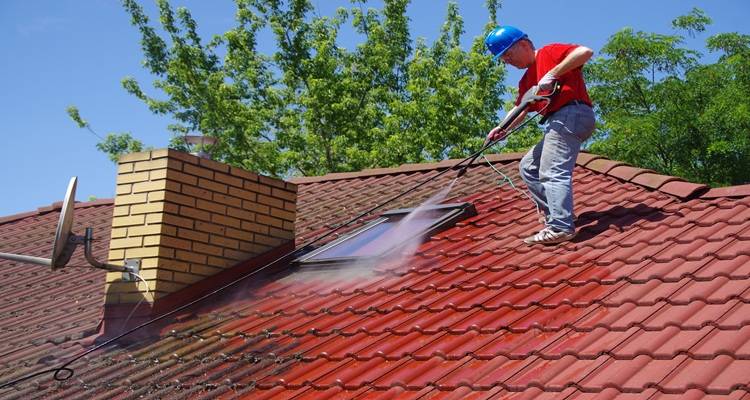 roof being jet washed